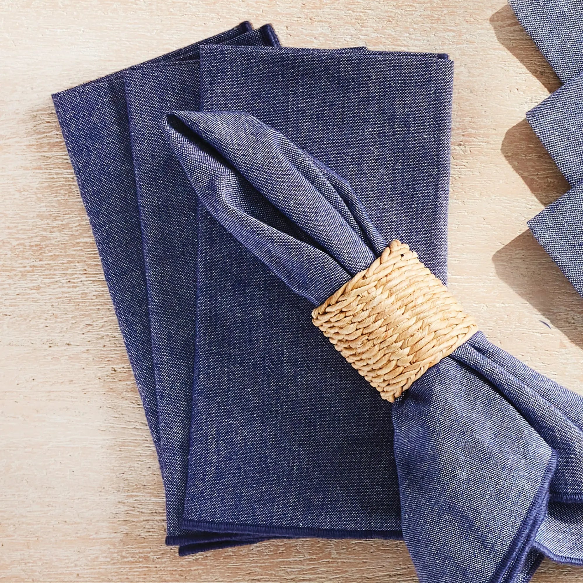 Elegant table accessories including napkins and napkin rings