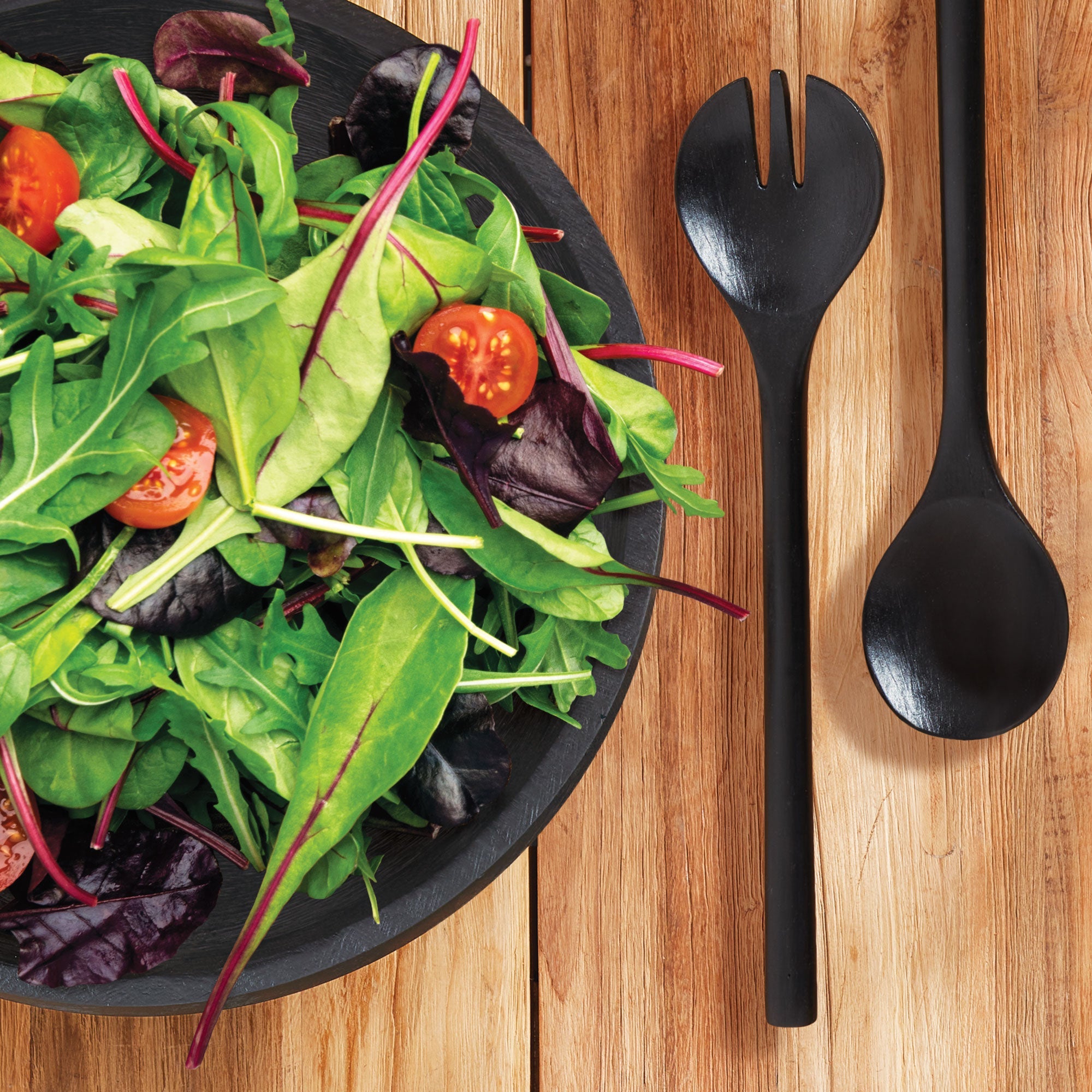 Large ceramic Serving Bowl filled with fresh green salad