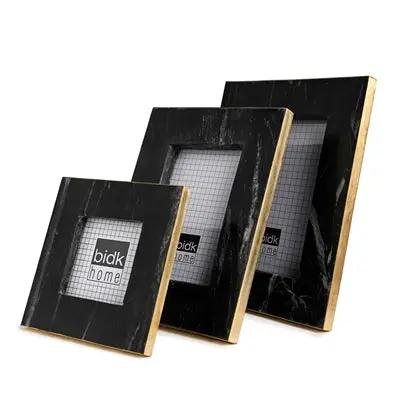 Black marble picture frame with brass trim holding 3.5x3.5 photo - luxury desk frame with easel stand for modern home décor