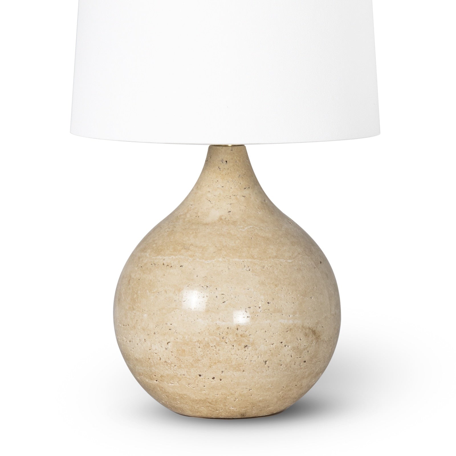 Noa Mini Table Lamp with a smooth, round natural travertine stone base and a simple fabric lamp shade.
