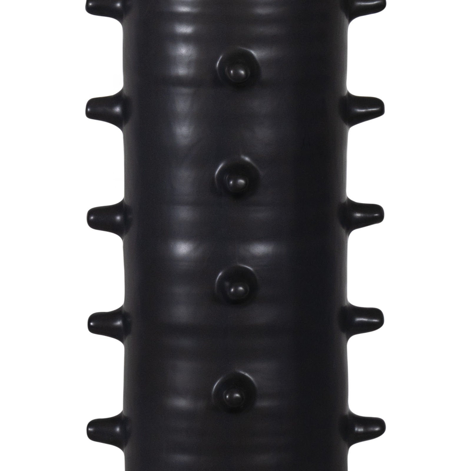 Black textured object on a white background