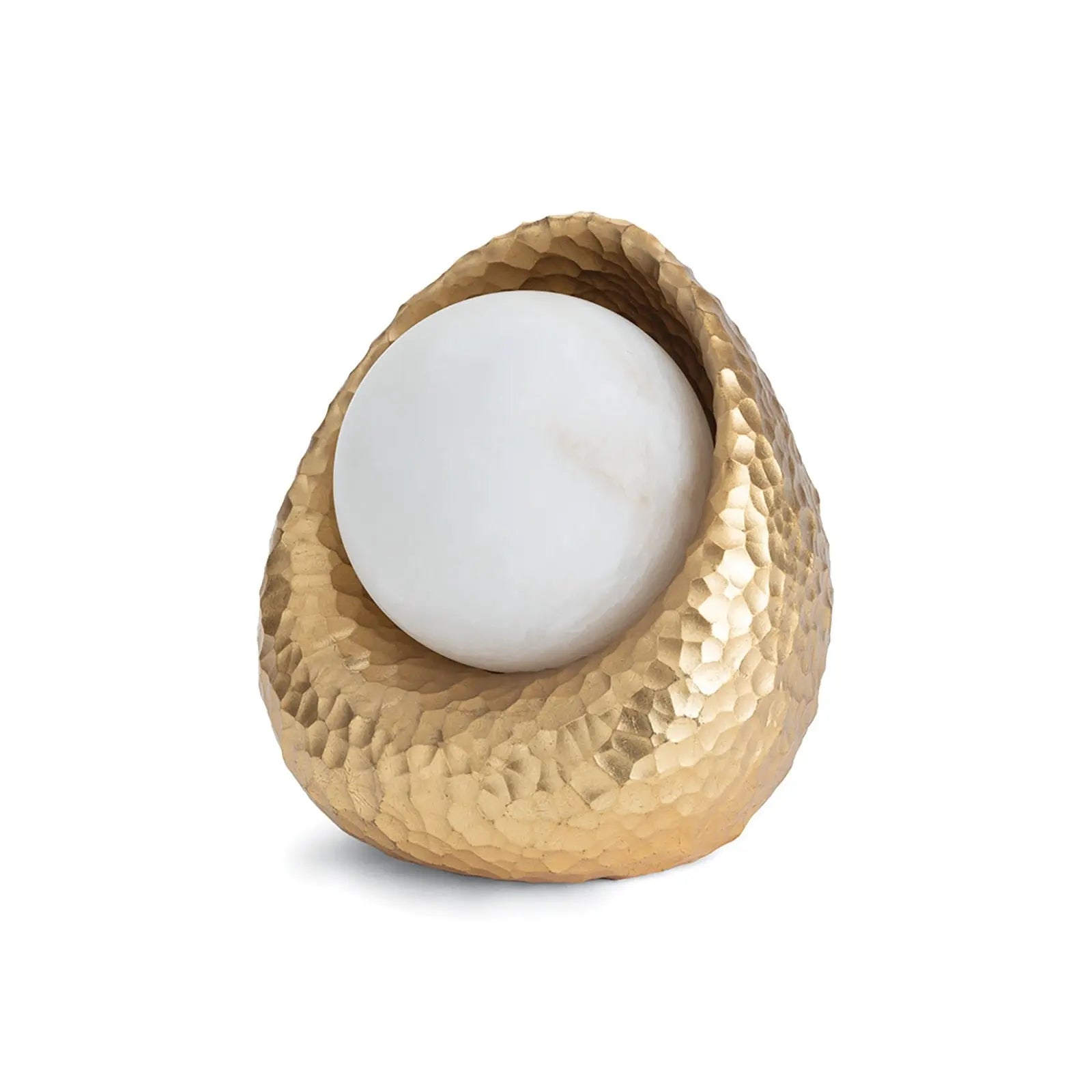 Nest Mini Lamp, a small decorative light fixture with an intricate gold resin hammered base and a round, soft glowing alabaster sphere.