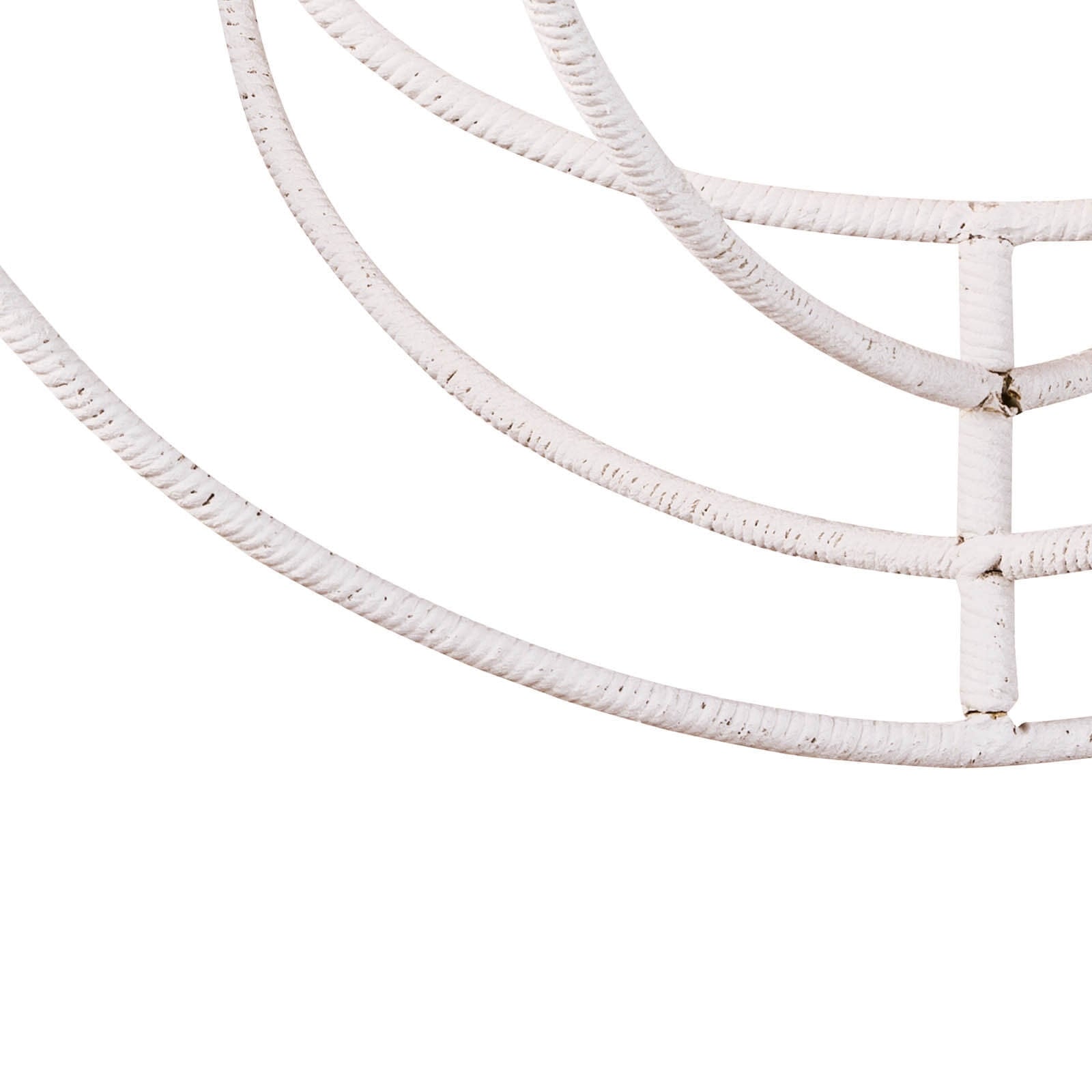 Close-up of a white decorative arch on a white background