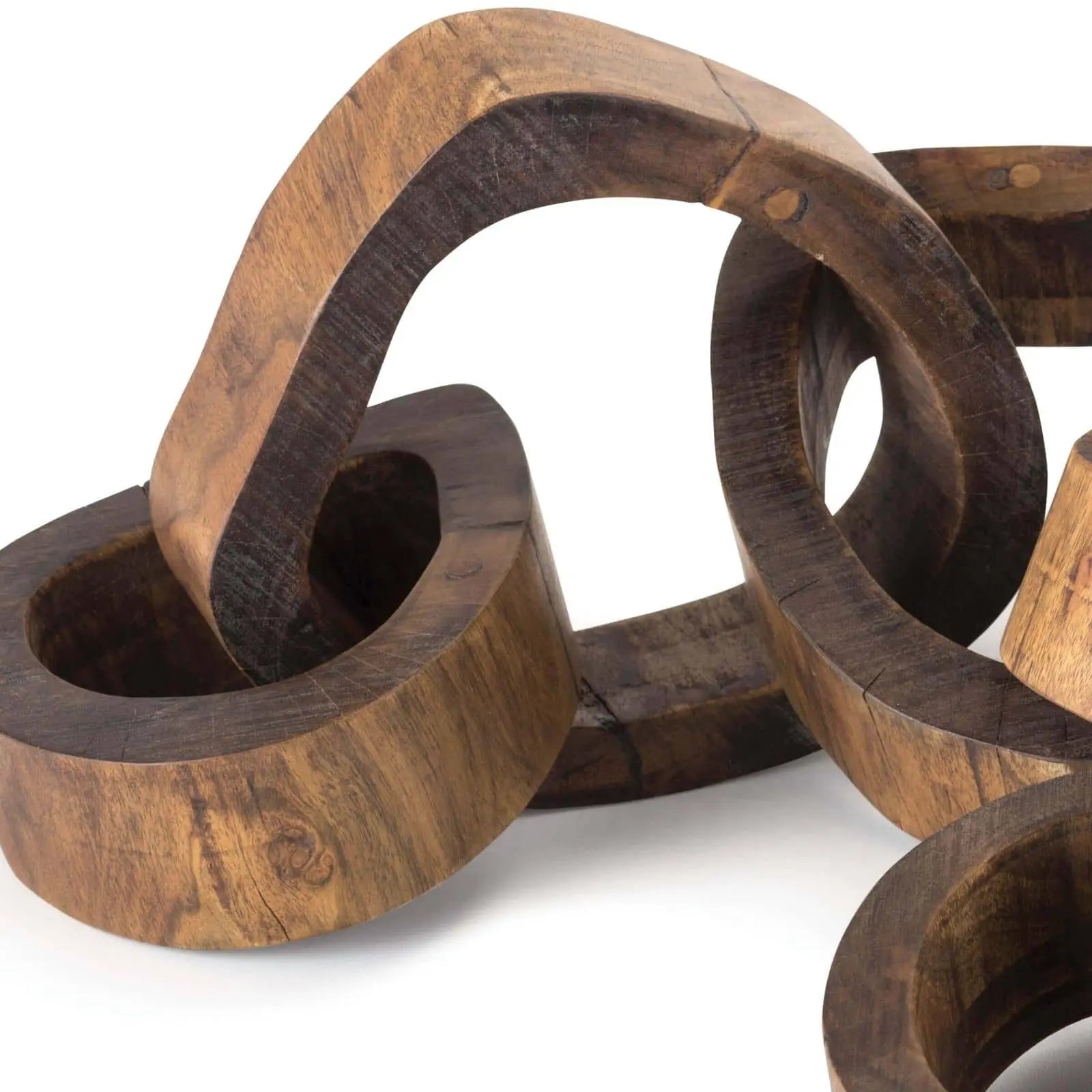Wooden interlocking rings on a white background