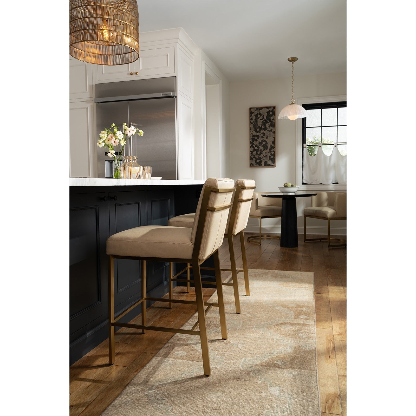 Chantal Leather Counter Stool in rich cappuccino leather with high-arched back and natural brass-plated legs