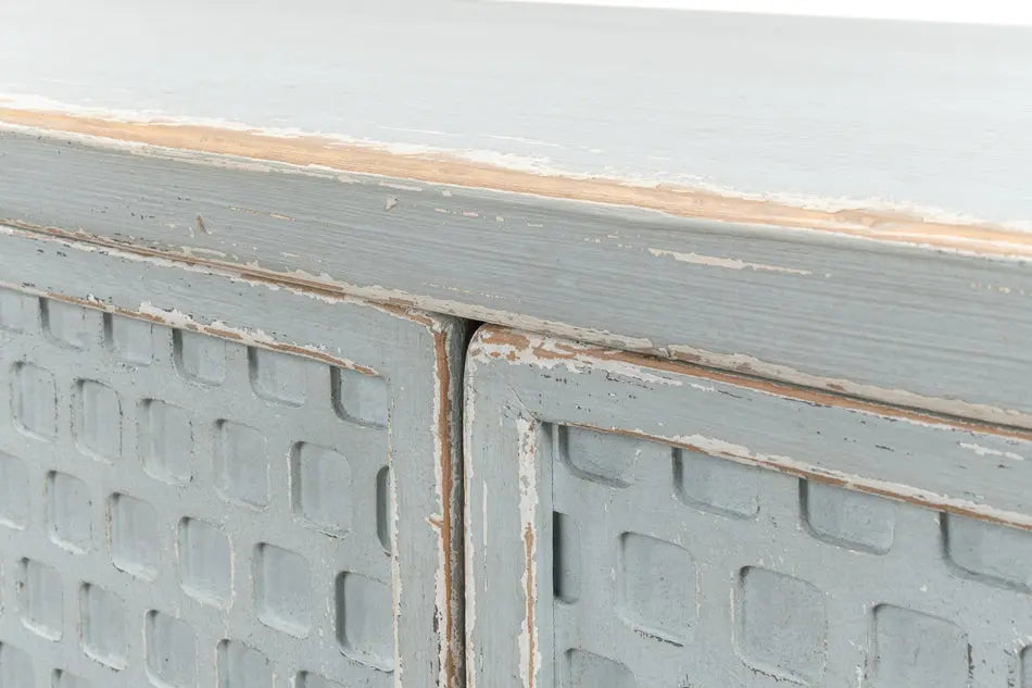 A stylish honeycomb front sideboard with a light aquamarine blue finish, showcasing the intricate geometric pattern and reclaimed wood texture.