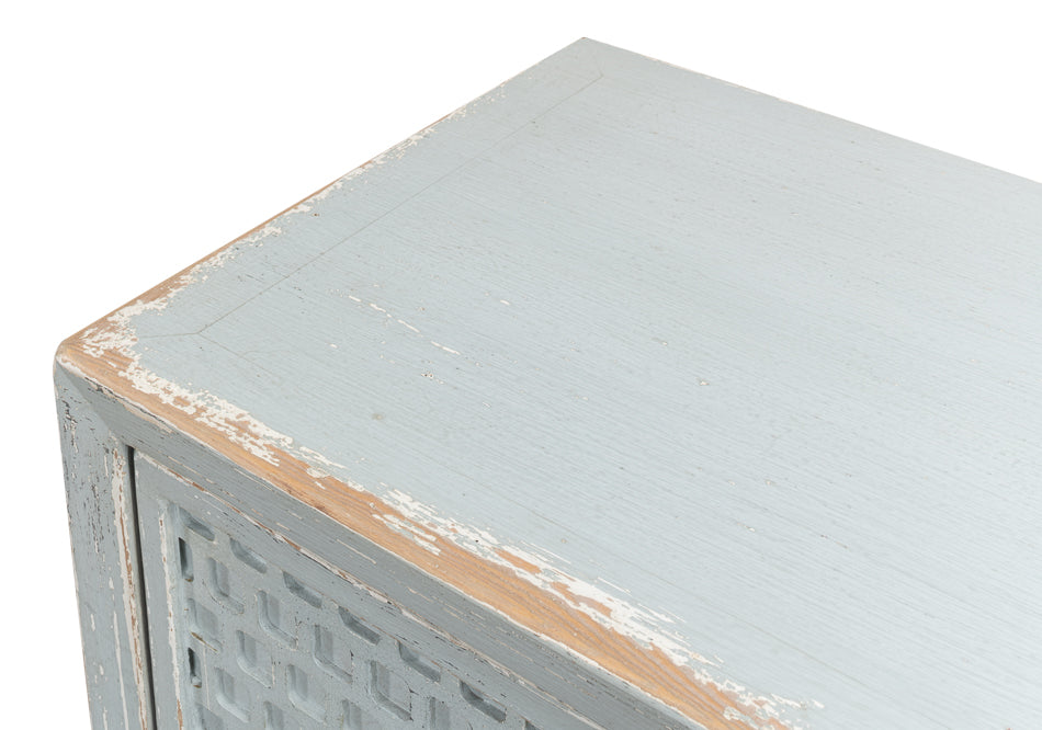 A stylish honeycomb front sideboard with a light aquamarine blue finish, showcasing the intricate geometric pattern and reclaimed wood texture.