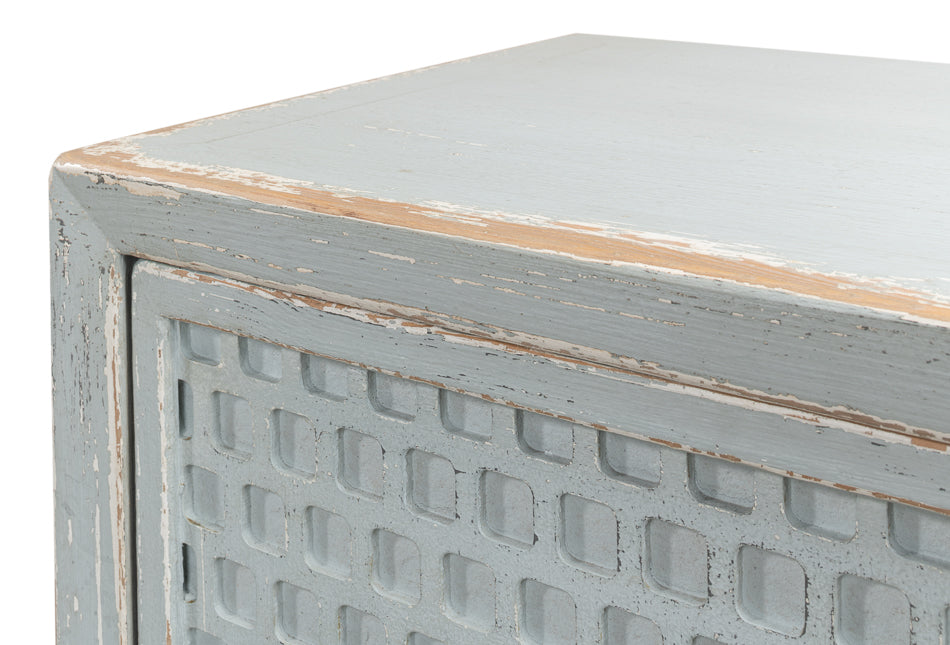 A stylish honeycomb front sideboard with a light aquamarine blue finish, showcasing the intricate geometric pattern and reclaimed wood texture.