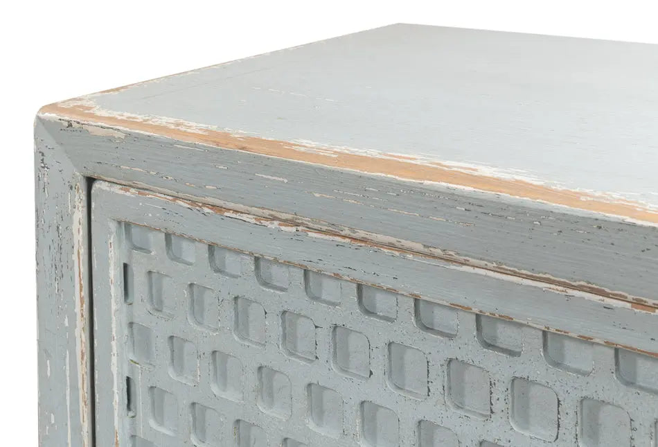 A stylish honeycomb front sideboard with a light aquamarine blue finish, showcasing the intricate geometric pattern and reclaimed wood texture.
