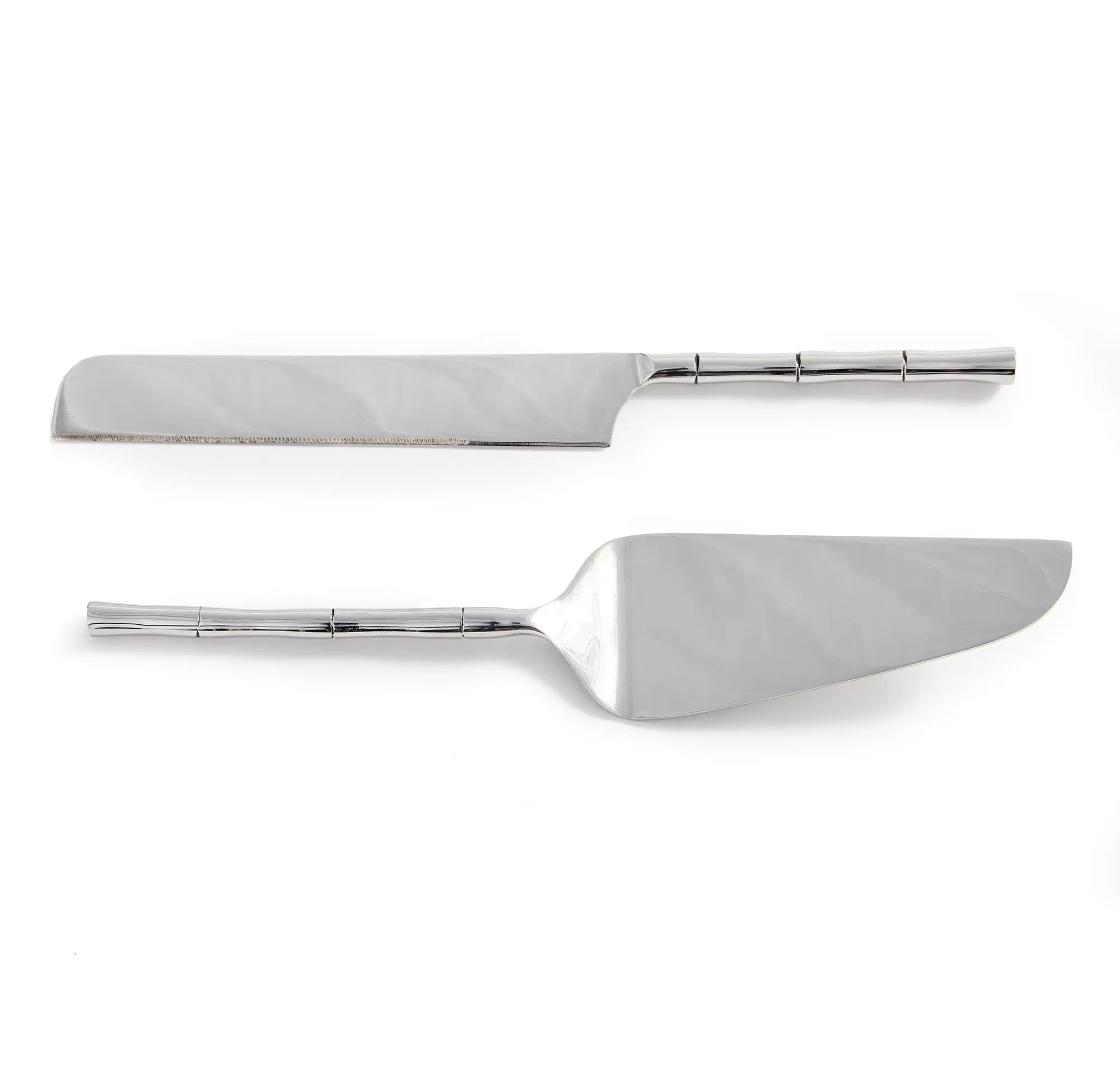 Stainless steel Grove dessert servers inside open retail gift box
