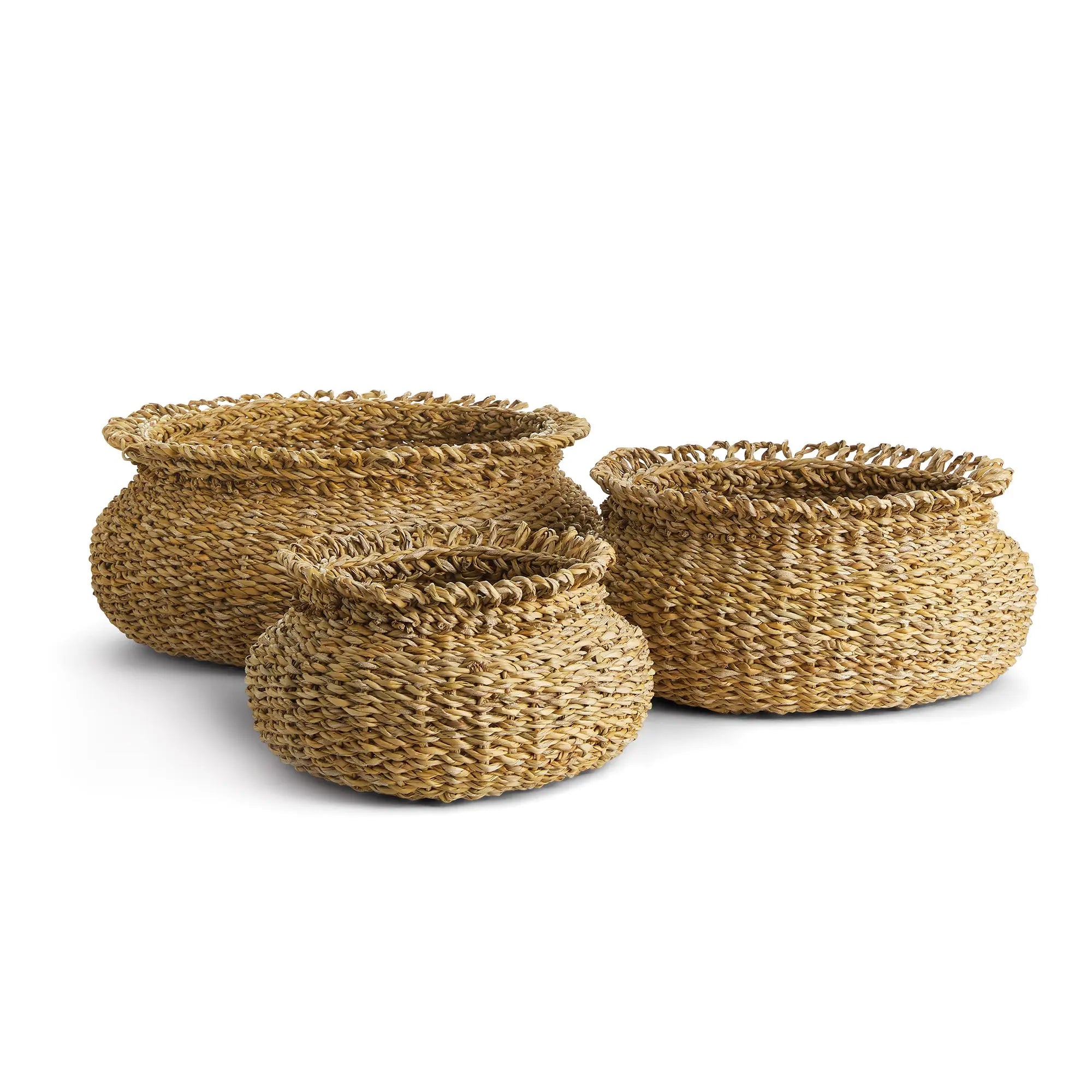 Three woven baskets of different sizes on a white background