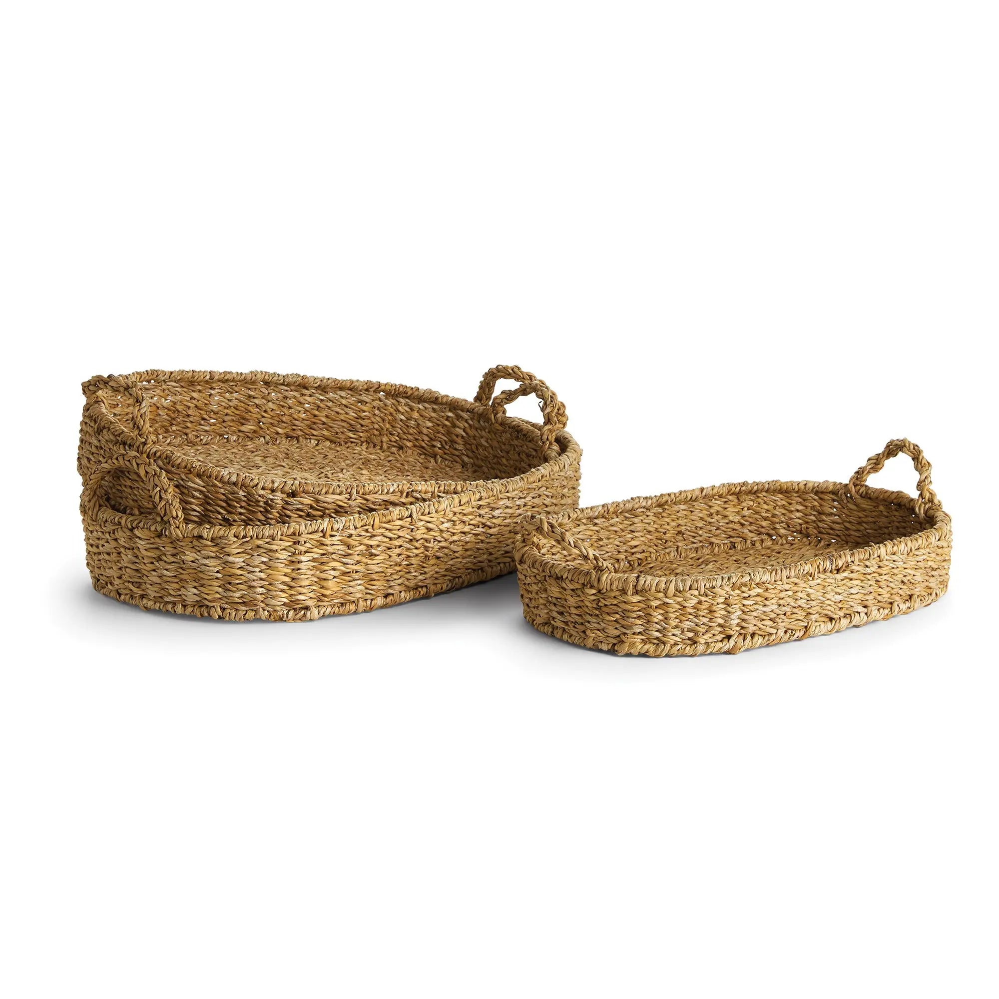 Three woven baskets with handles on a white background