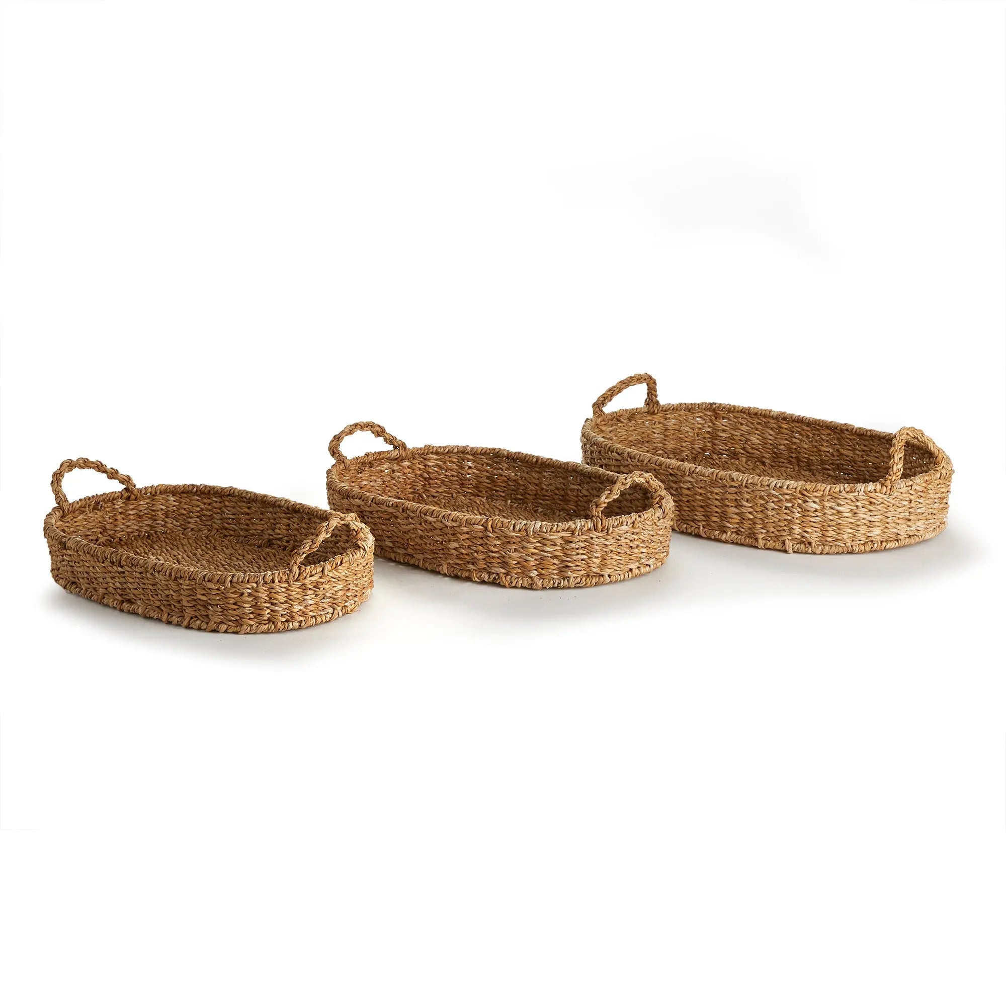 Three woven baskets of different sizes on a white background