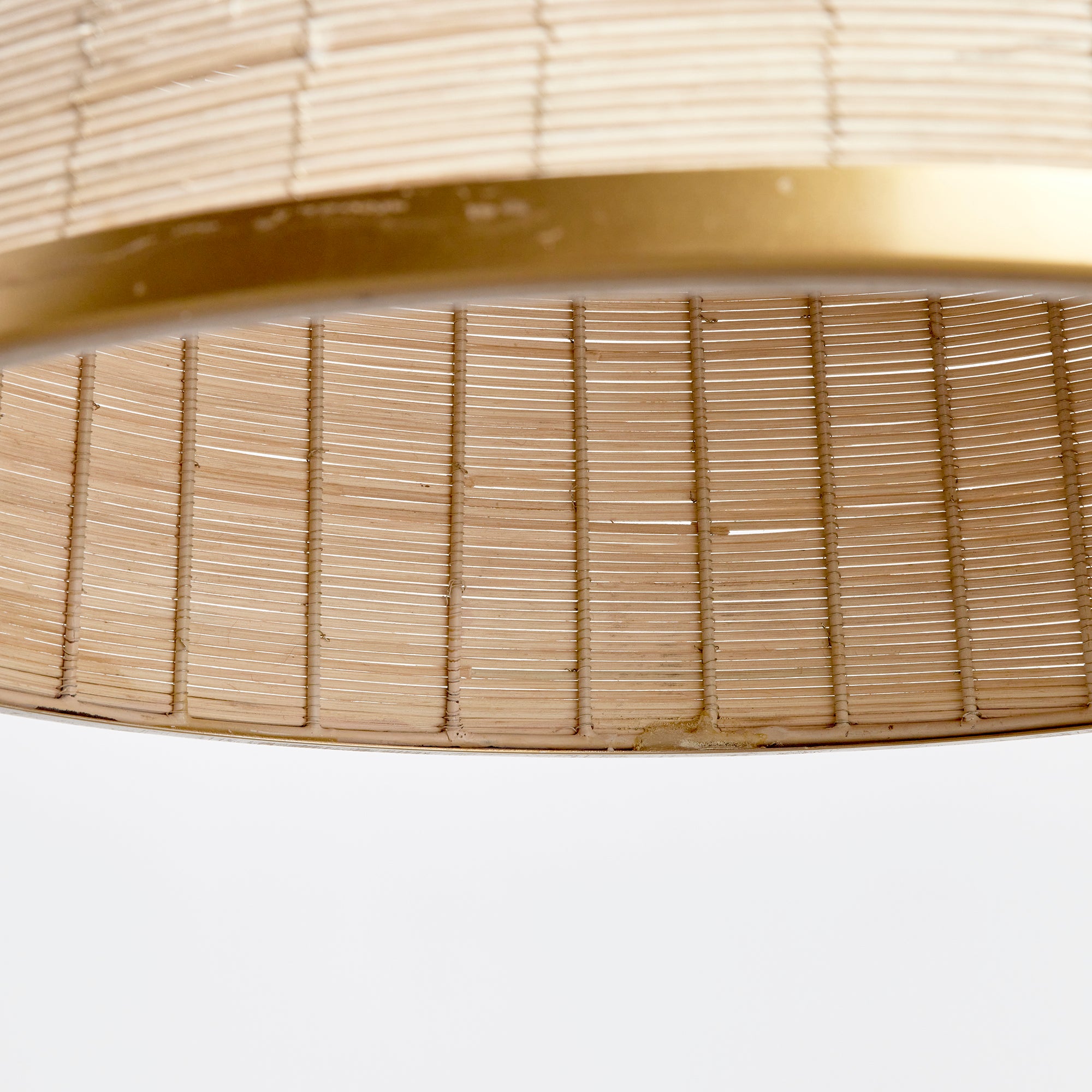 Maye Bell Pendant made of whitewashed rattan with brass accents