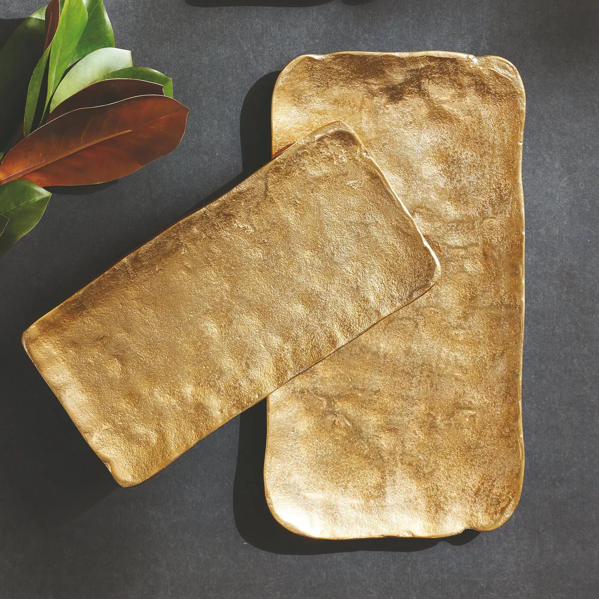 Imani Decorative Trays - modern gold cast aluminum trays with rounded edges, available in rectangular set of 2 or square set of 3