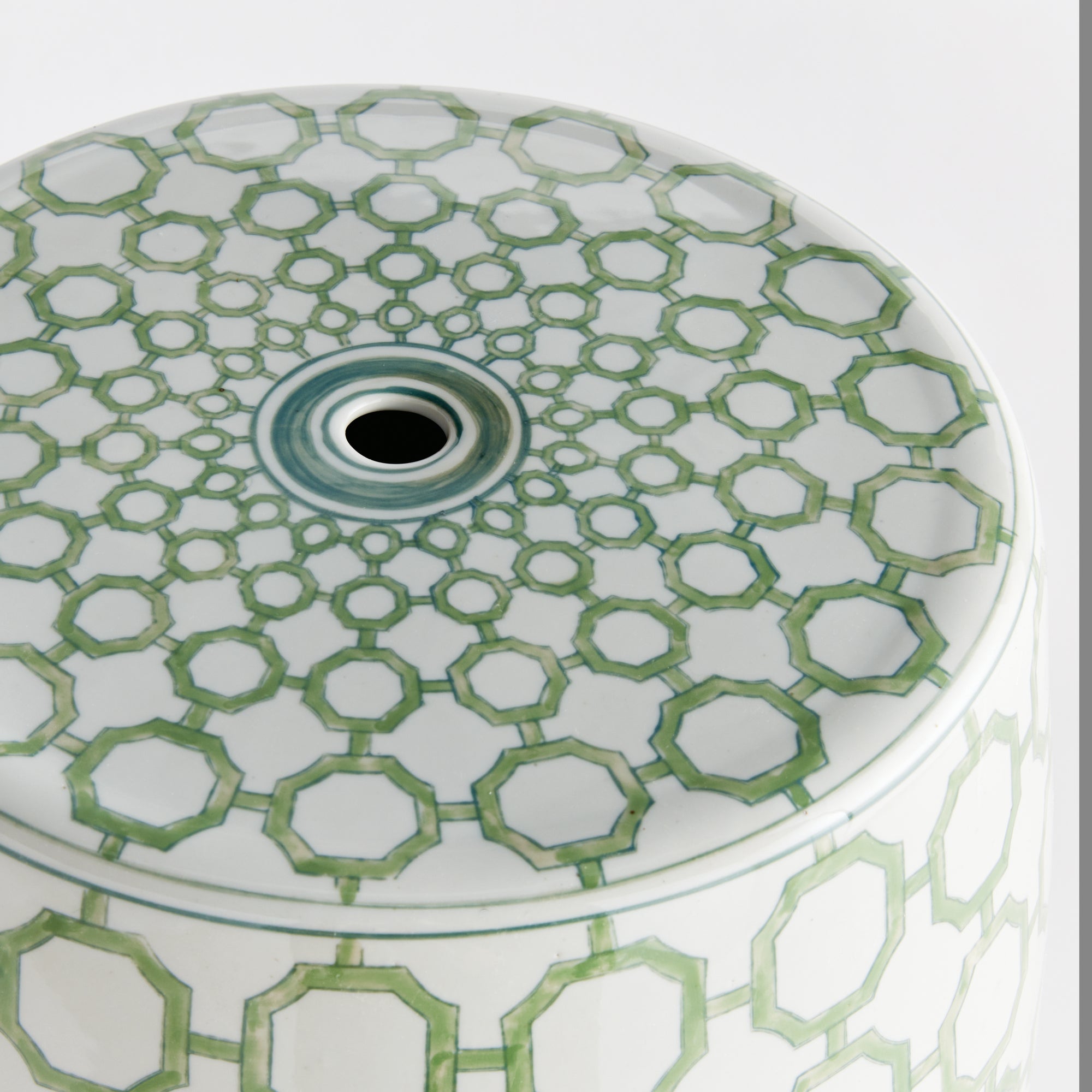 Imperial Link Stool - green and white chinoiserie ceramic garden stool with distinctive link pattern for versatile seating and accent table use