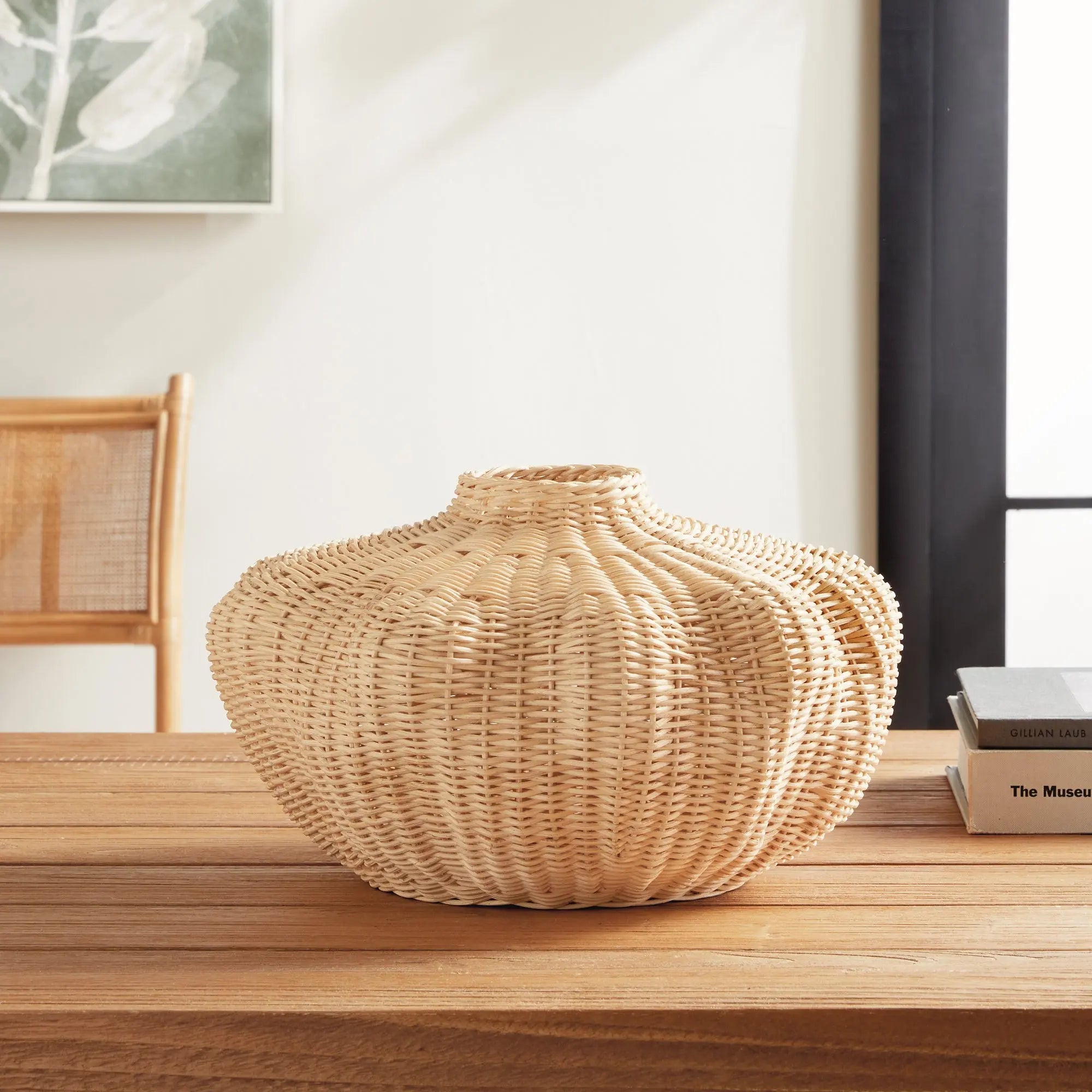 Handwoven short rattan vase with sculptural shape