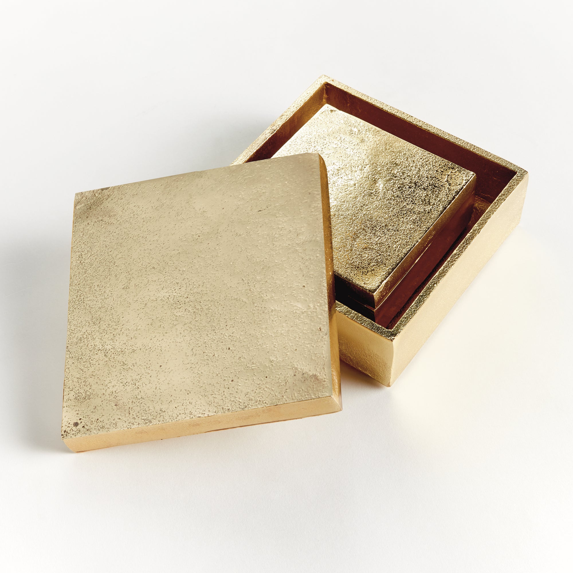 Set of 2 gold Cressida lidded boxes handcrafted from sand-cast aluminum
