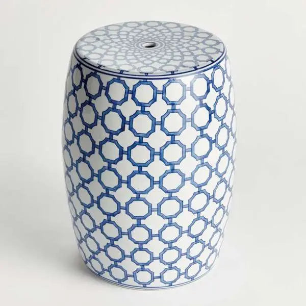 Barclay Butera Dynasty Link Stool, showing a blue and white ceramic stool with a classic chinoiserie-inspired link pattern. The stool is cylindrical and is shown against a plain background to highlight its intricate design.