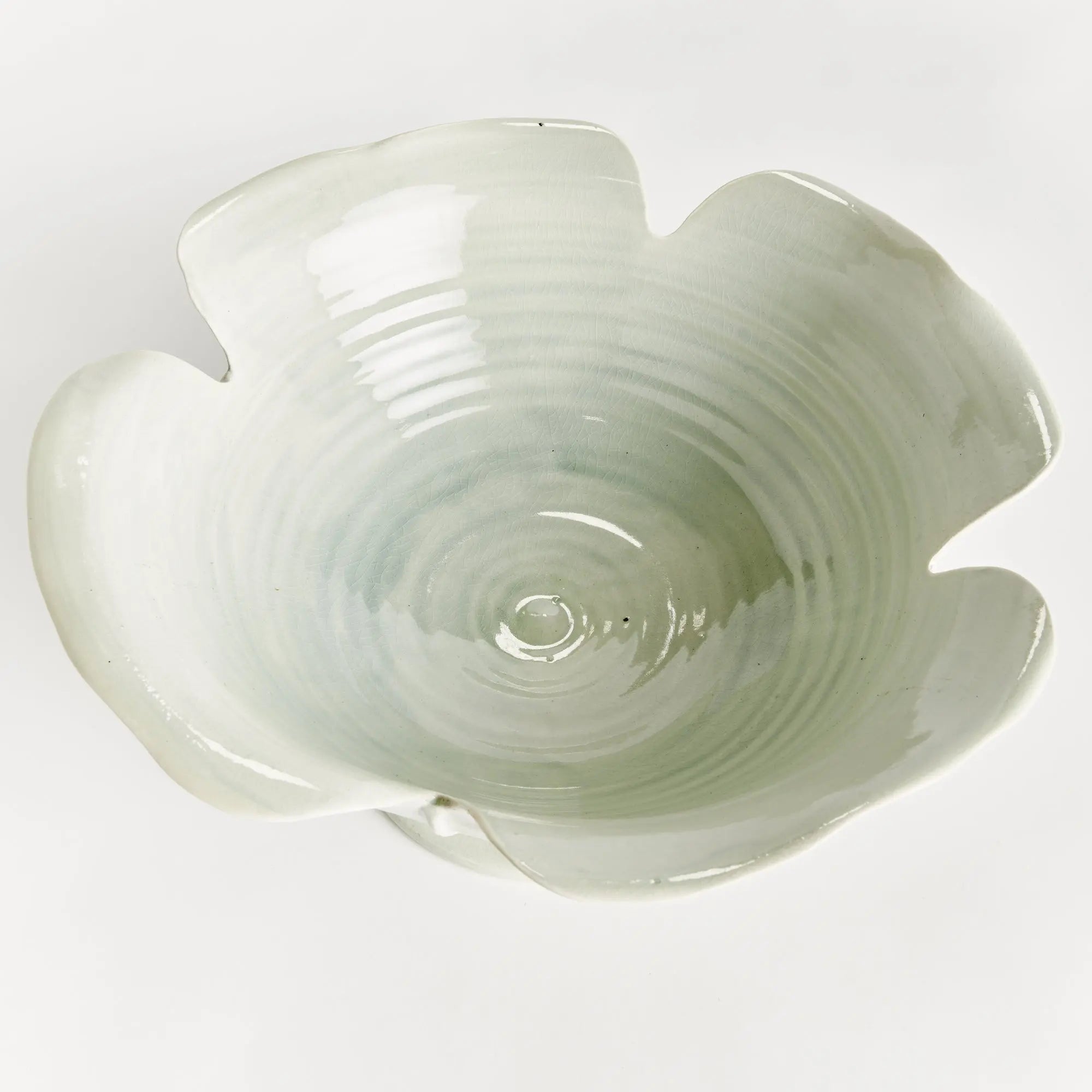 Handmade ceramic footed bowl with petal design in celadon glaze