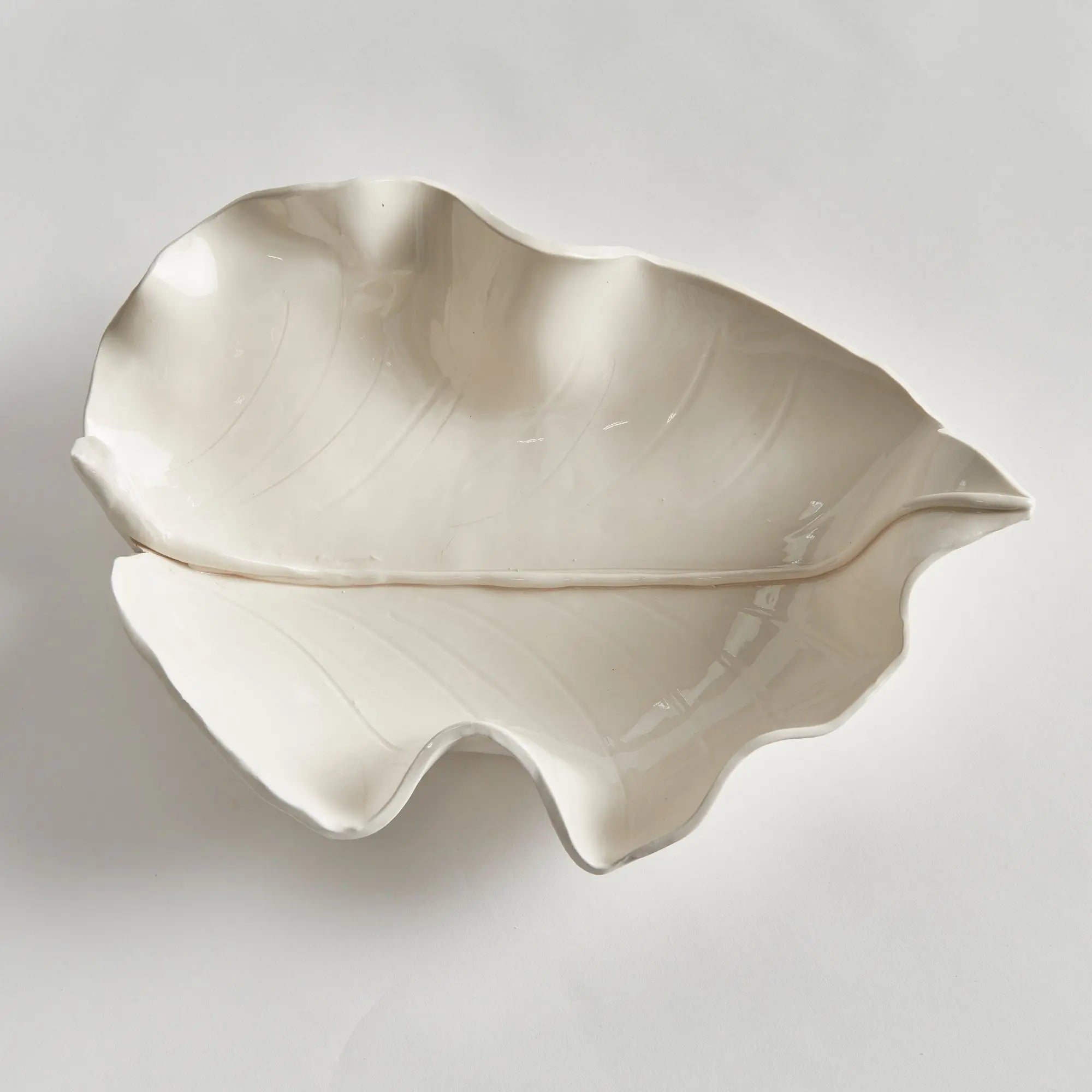 Handcrafted ceramic leaf sculpture in white glaze – small size