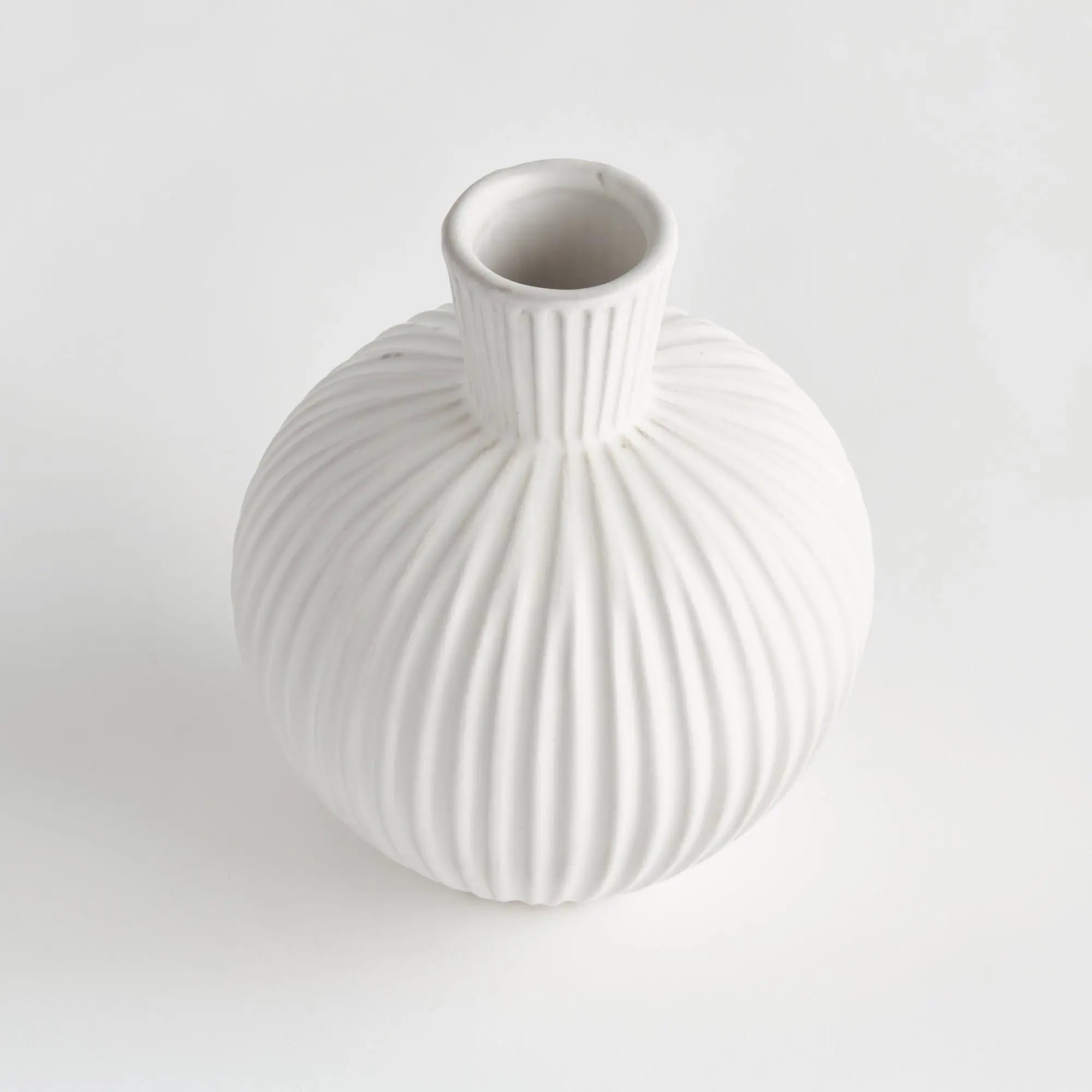 Large white ribbed ceramic Pravi Vase with bottle silhouette