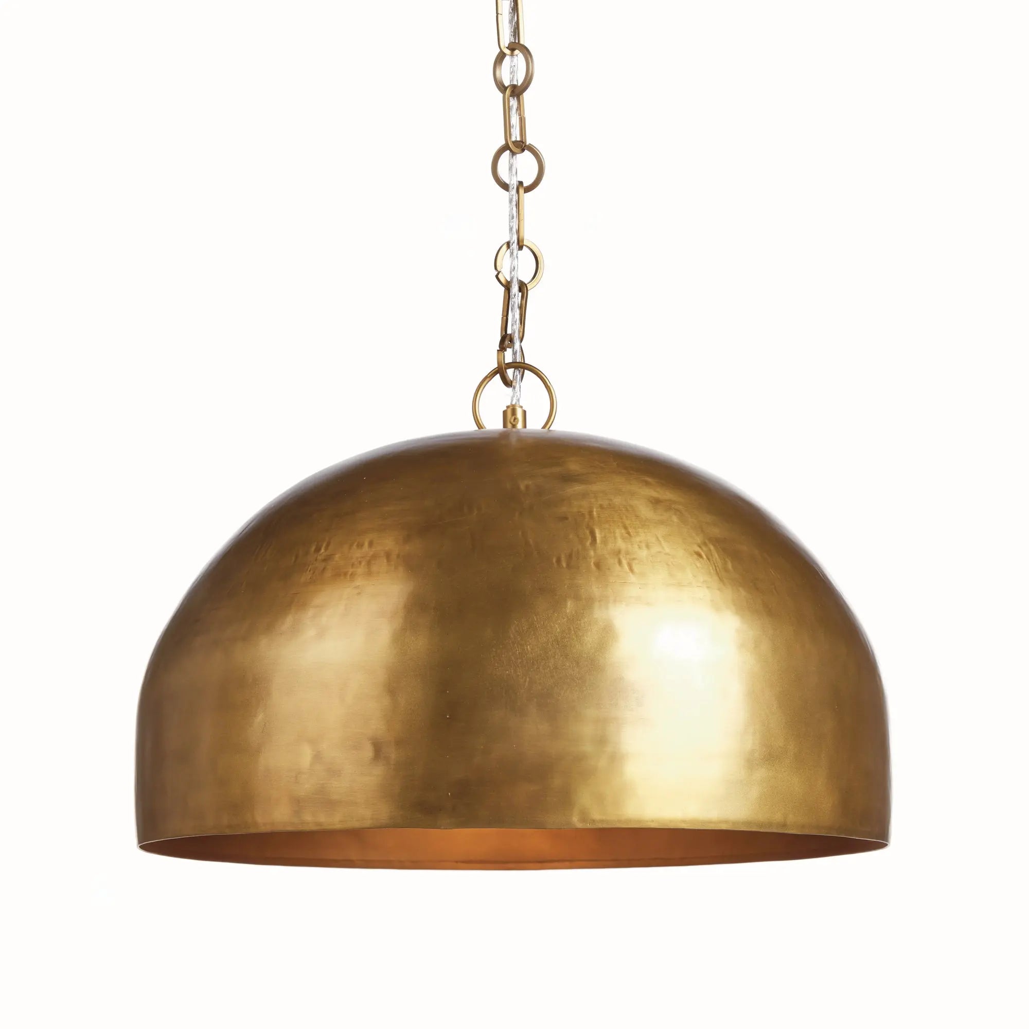 Gold pendant light on a white background