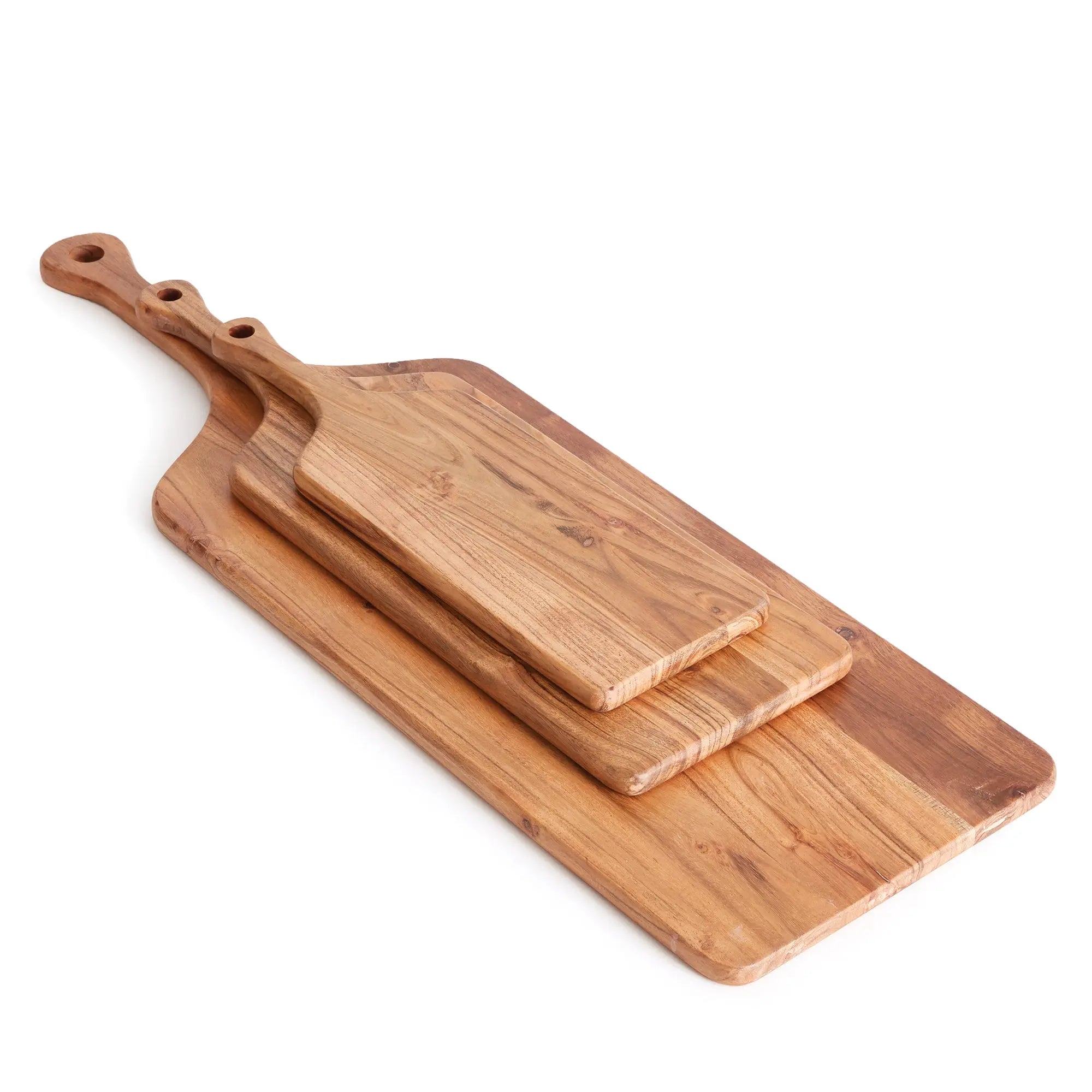 Set of wooden cutting boards with handles on a white background