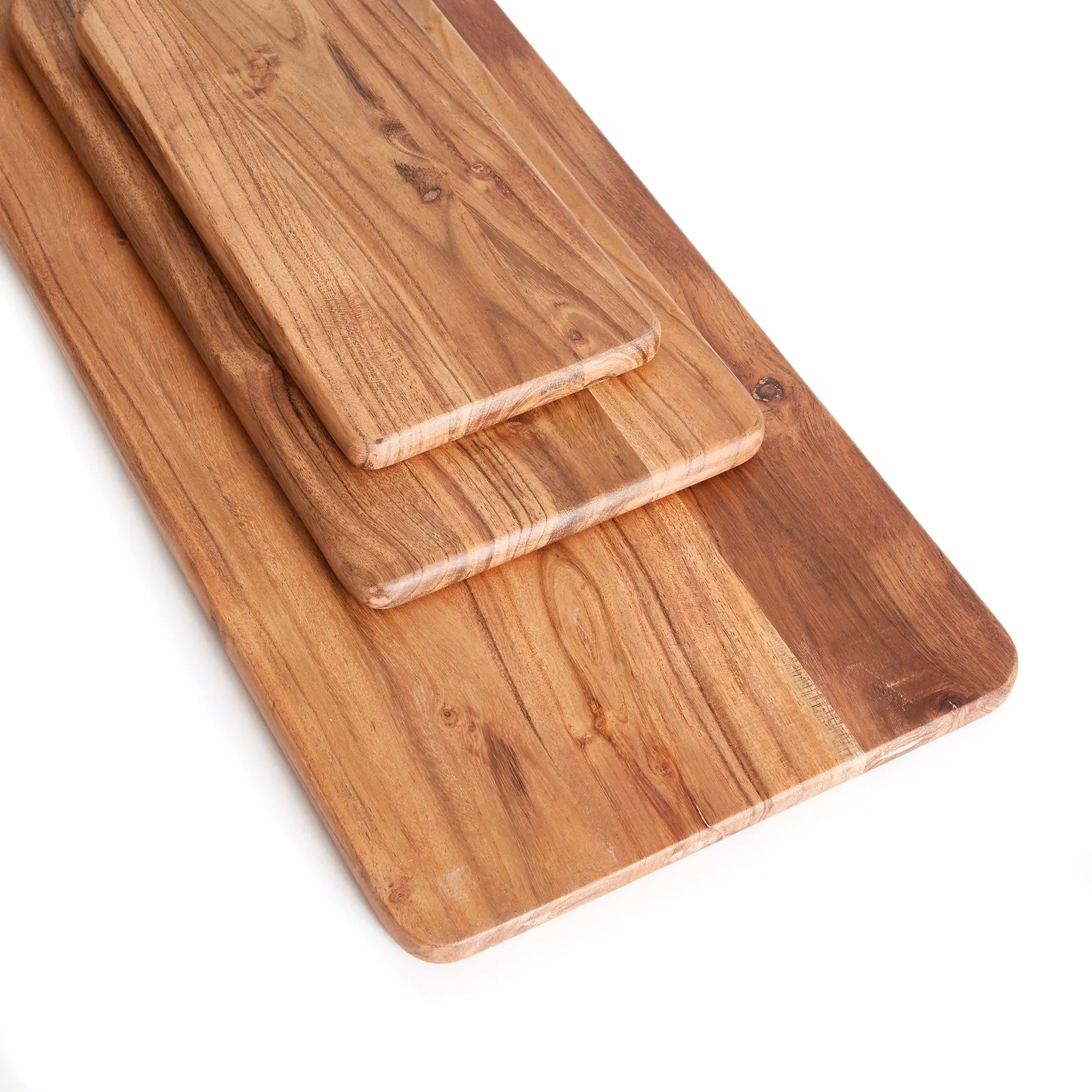 Two wooden cutting boards on a white background