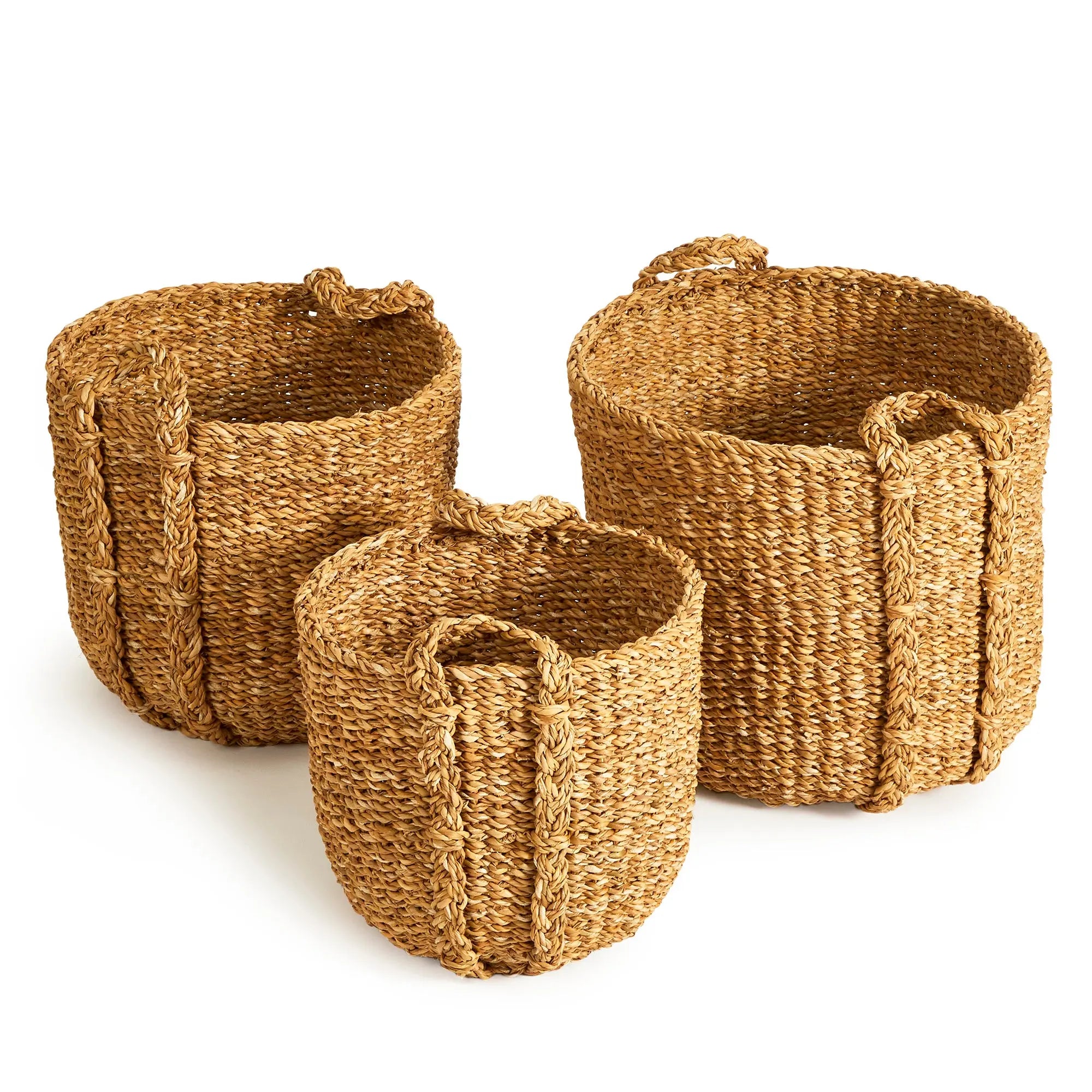 Three woven baskets of different sizes on a white background