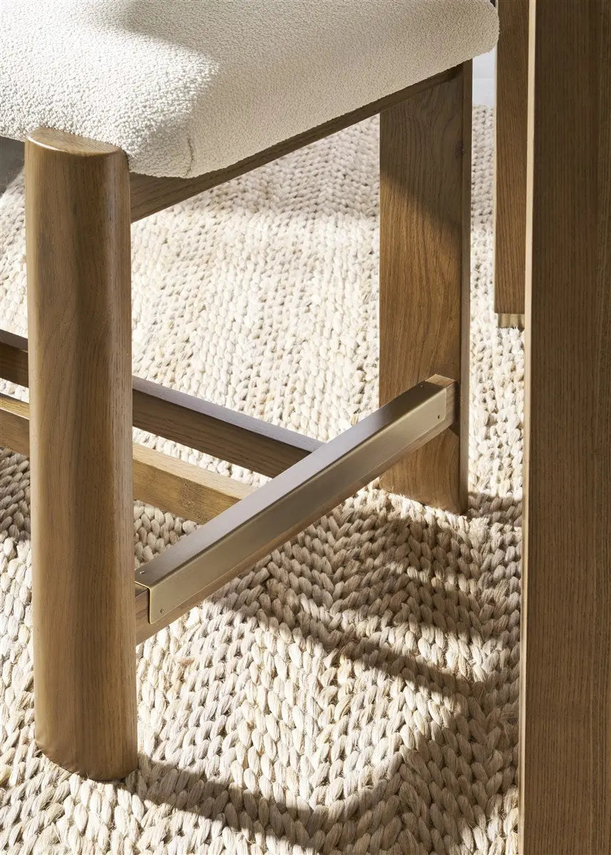 Wright Dining Counter Stool upholstered in Jackpot Chalk fabric with Saddle finish and antique brass kickplate