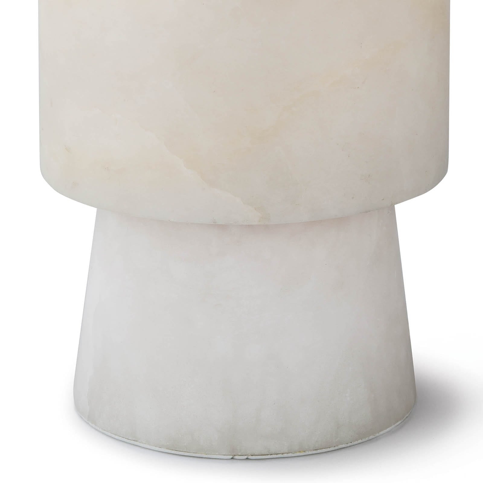 Hazel Alabaster Uplight, a small decorative lamp made from translucent natural alabaster stone, directing light upwards.