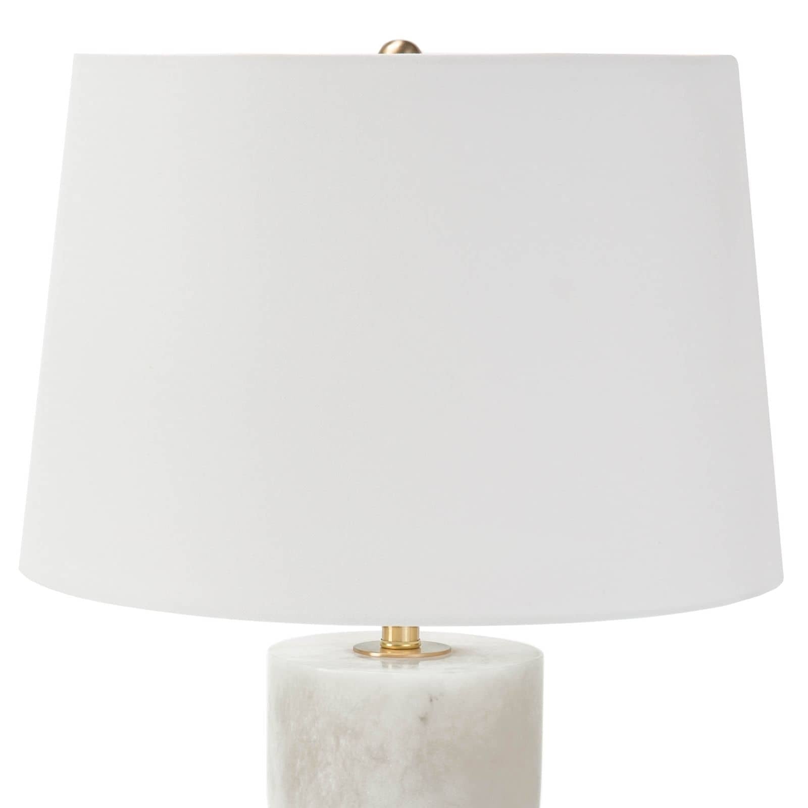 Table lamp with a white shade and marble base on a white background