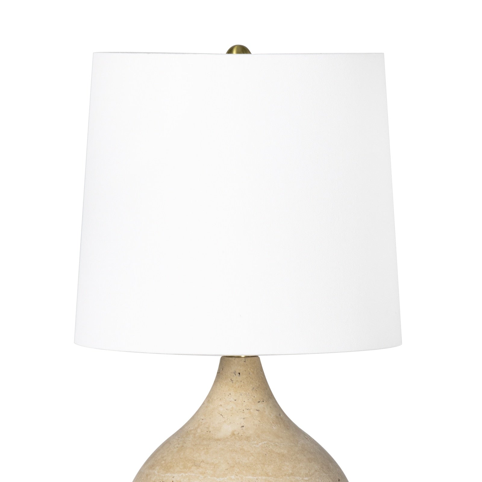 Noa Mini Table Lamp with a smooth, round natural travertine stone base and a simple fabric lamp shade.