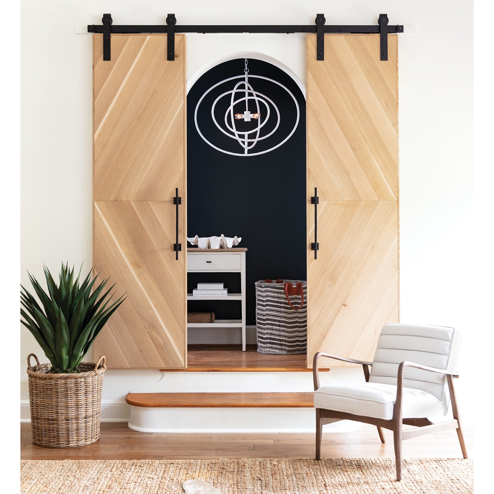 Wooden sliding doors in a modern interior setting with a chair and plant.