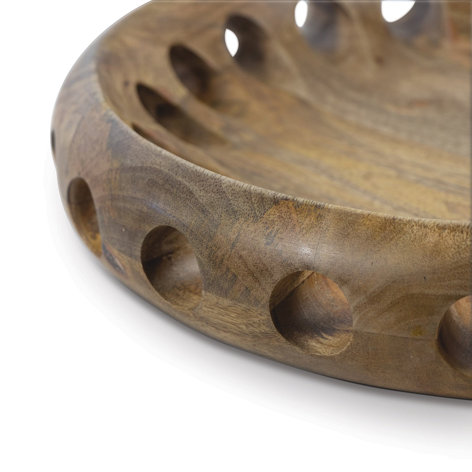 Wooden decorative bowl with multiple holes on a white background