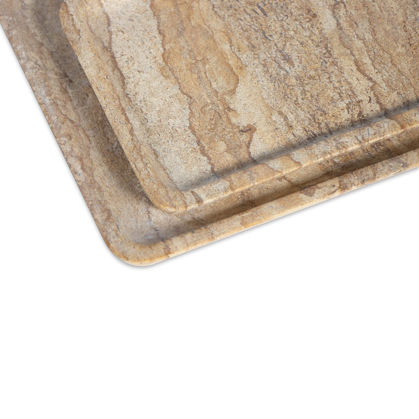 Close-up of a stone-patterned surface on a white background