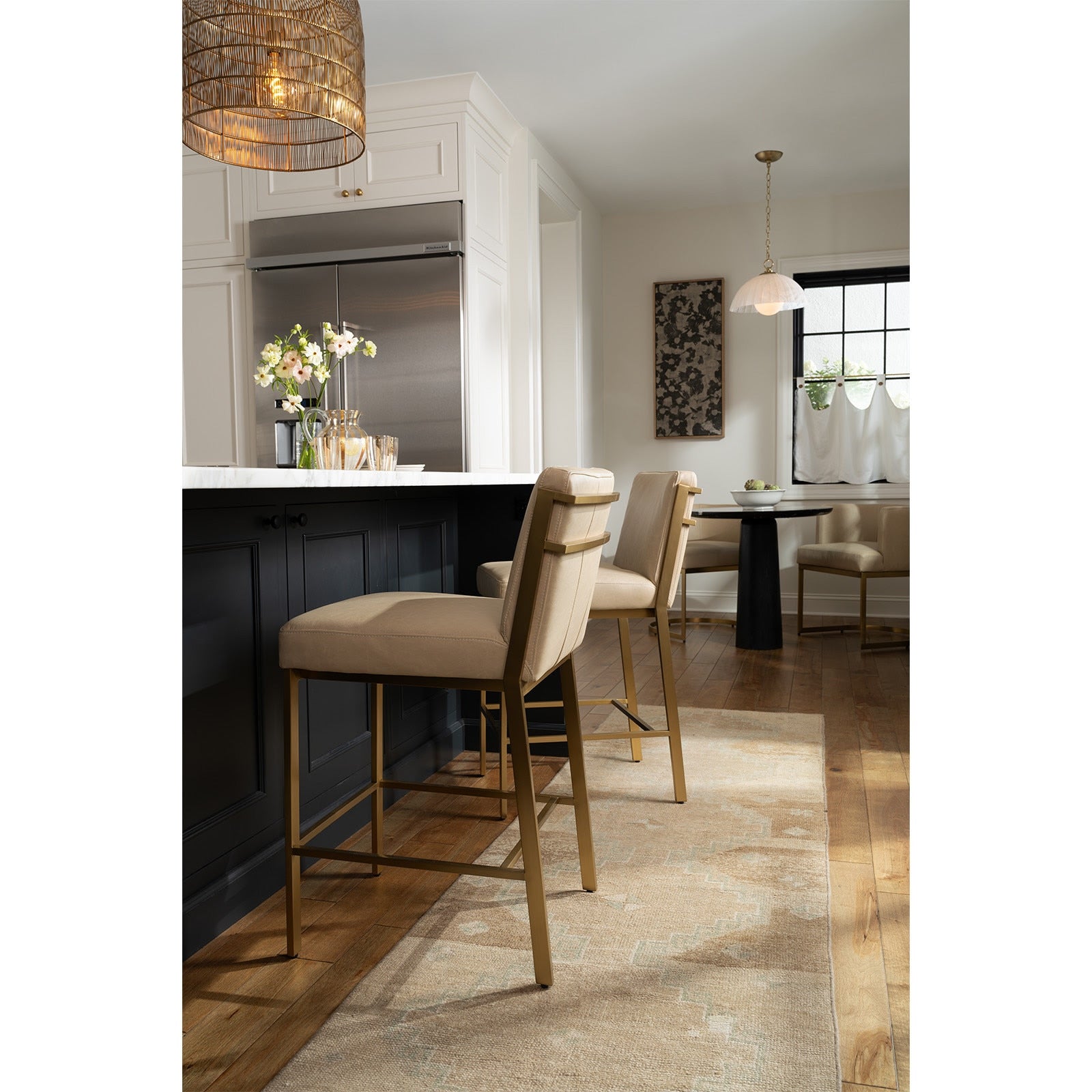Chantal Leather Counter Stool in rich cappuccino leather with high-arched back and natural brass-plated legs