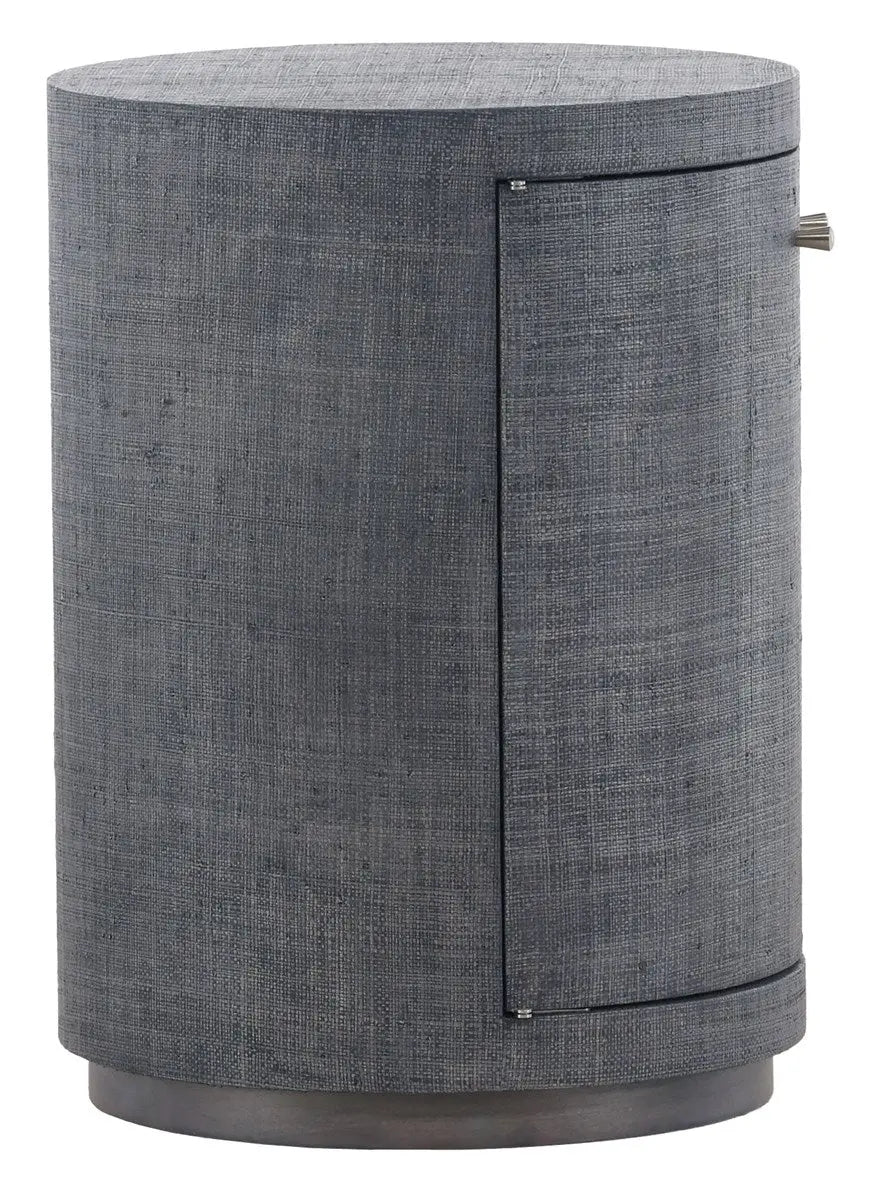 A round Navy Raffia wrapped end table with two curved doors, a Grey Agate stone knob, and a dark wood base, standing 25 inches tall.