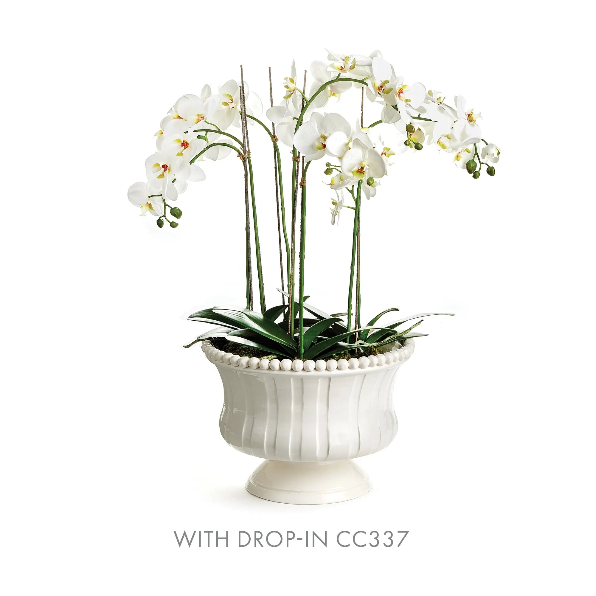 A large white footed decorative ceramic bowl with subtle vertical ribbing and hand-applied beaded trim, handmade by artisans in Tuscany, Italy.