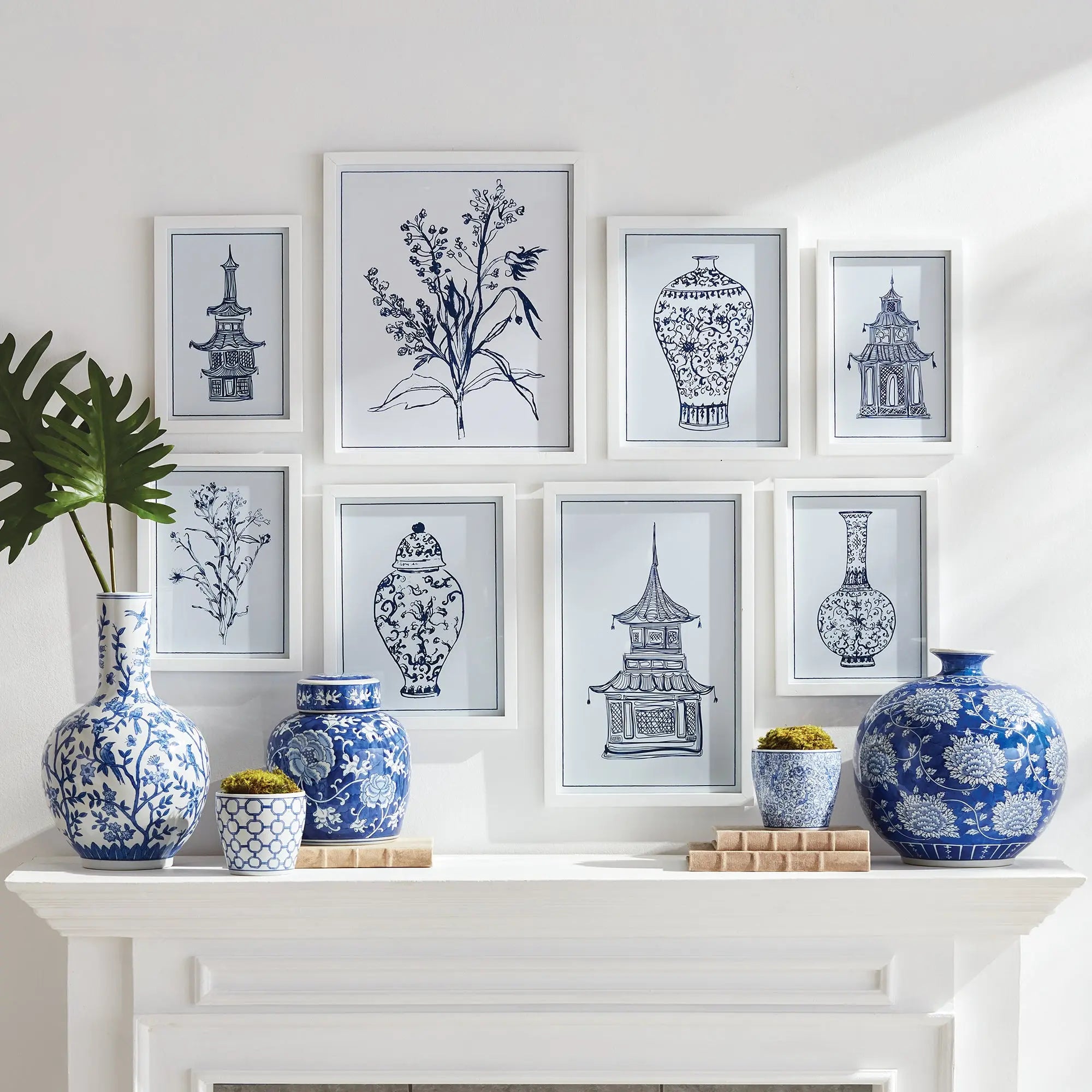Chinoiserie Gallery Prints. Set of 8 monochromatic blue prints in white fir wood frames. Curated for a stunning salon-style gallery wall. 5 varied sizes. Perfect for coastal or traditional homes.