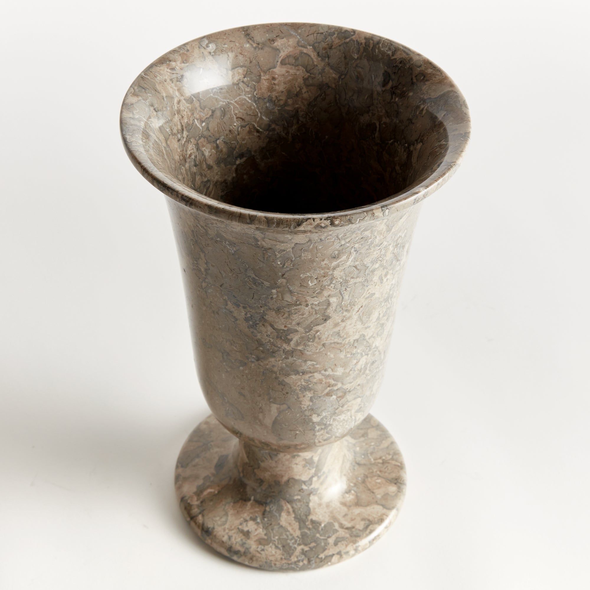 Claria footed vase in natural marble with brown veining