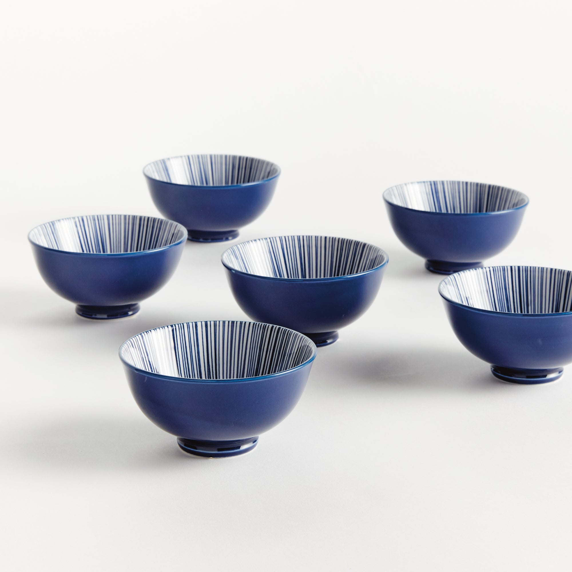 Stria 4.75" Bowls Set of 6 - dark blue and white striped ceramic dip bowls with modern striated pattern for serving and entertaining