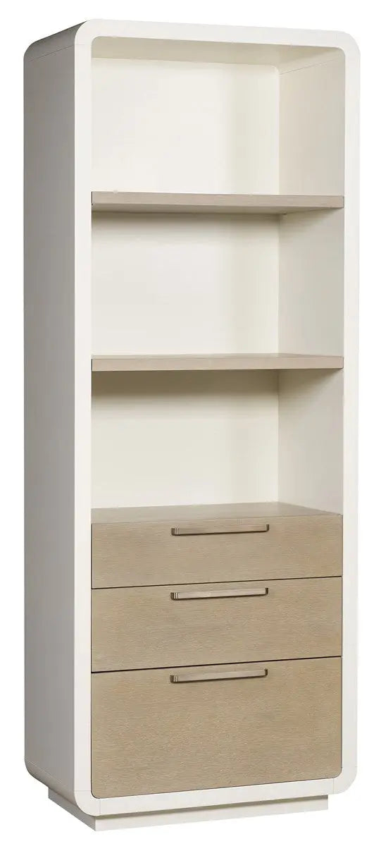 A tall, 84-inch Cove Etagere bookshelf featuring white frost maple sides, cerused taupe oak drawer fronts with long champagne bar handles, and a bottom file drawer.